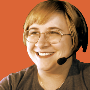 headshot of lady wearing a headset