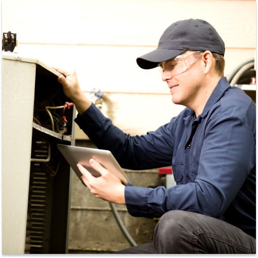 A technician completing an inspection during the HVAC sales process