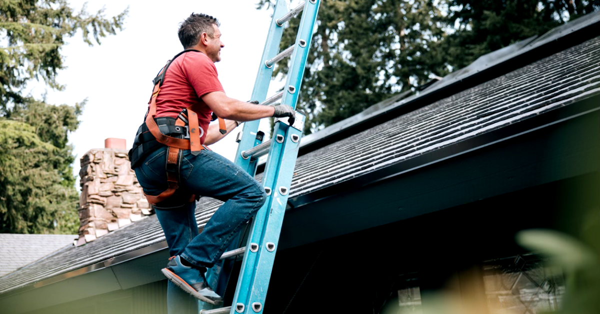 A contractor working to improve the average roofing company revenue