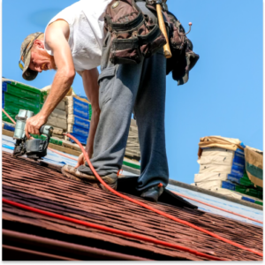 A roofer begins to install a new roof