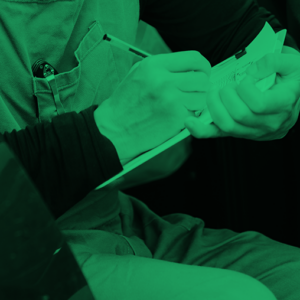 Hands filling out forms